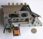 Unknown Plus Adder, left side mechanism