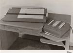 Photo of desk with pegboard and Comptometer 992
