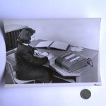 Photo of woman at desk with Comptometer 992