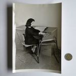 Photo of woman at desk with Comptometer 992 on side table