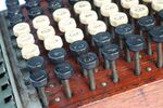 Wooden comptometer