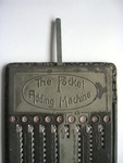 The Pocket Adding Machine, clearing tab fully extended